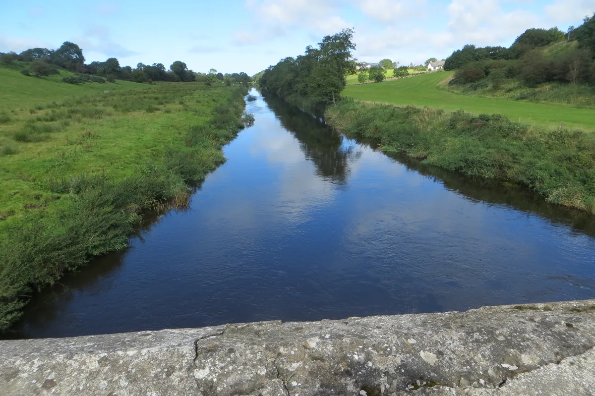 The River Bush flowing near Bushmills, County Antrim, Northern Ireland