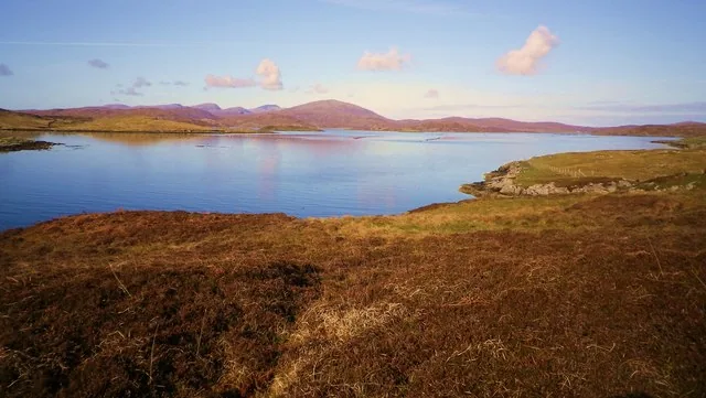 View of Loch Roag near Hacklete on Great Bernera in the Outer Hebrides, with calm sea-loch water and distant hills.