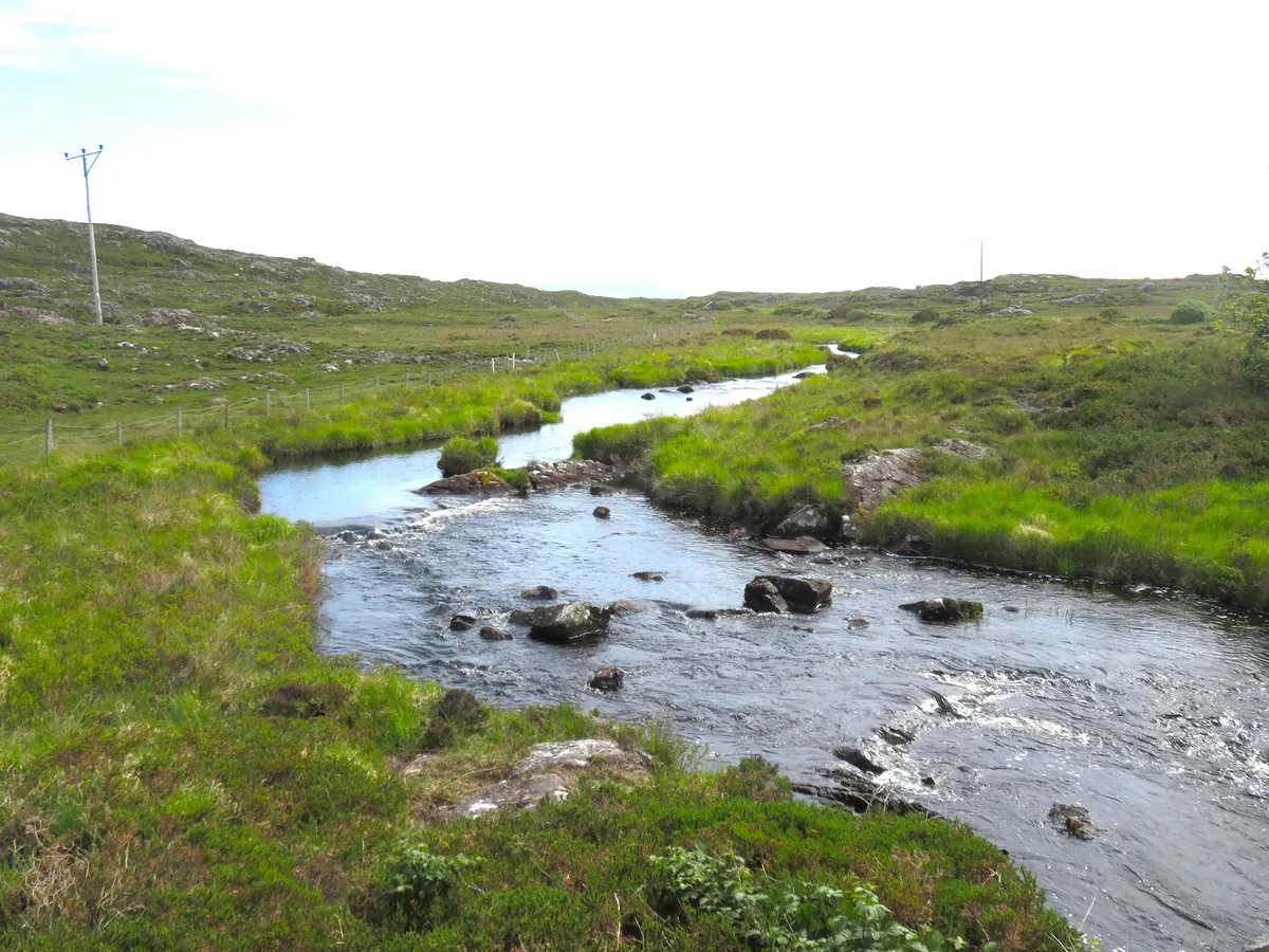 A Connemara river running through open moorland near Gowla, County Galway, Ireland.