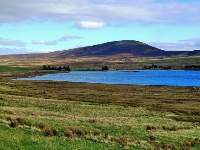 Wide view across Harperrig Reservoir towards East Cairn Hill in the Pentland Hills
