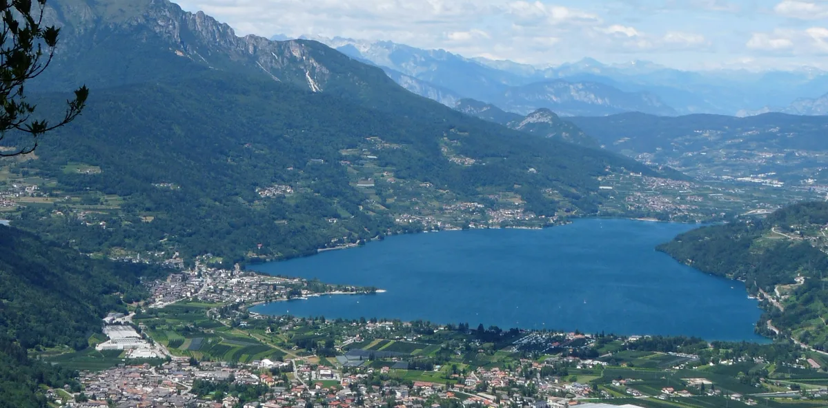 Aerial view of Lake Caldonazzo and the town of Caldonazzo from the Menador belvedere, Valsugana valley, Trentino, Italy