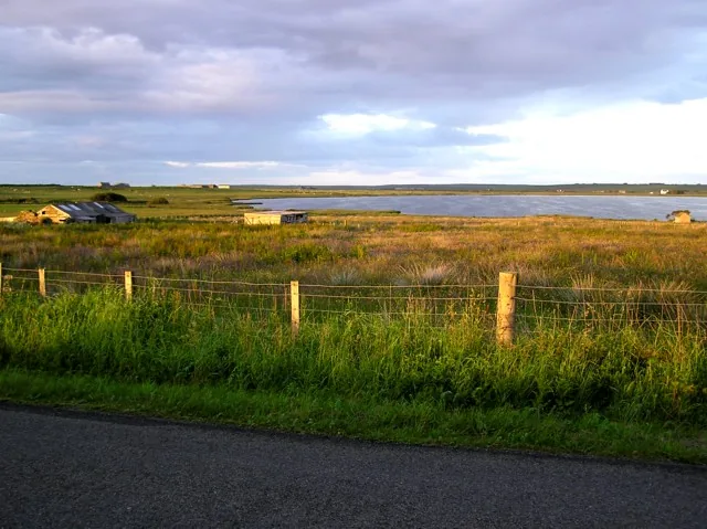 St John's Loch in Caithness, Scotland, at evening with anglers fishing from the shore.