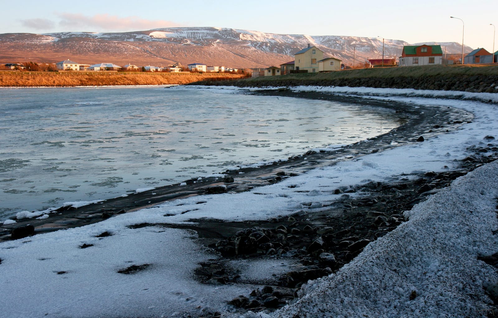 The Blanda river flowing through the town of Blönduós, north Iceland, in November.