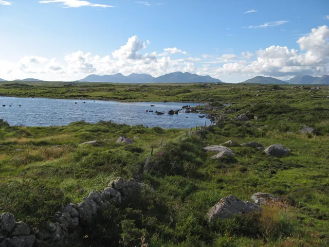 Invermore lough surrounded by Connemara bogland and low hills.