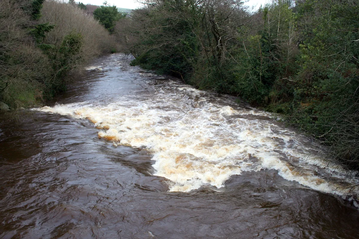 The Aughrim River flowing through the countryside of County Wicklow, Ireland