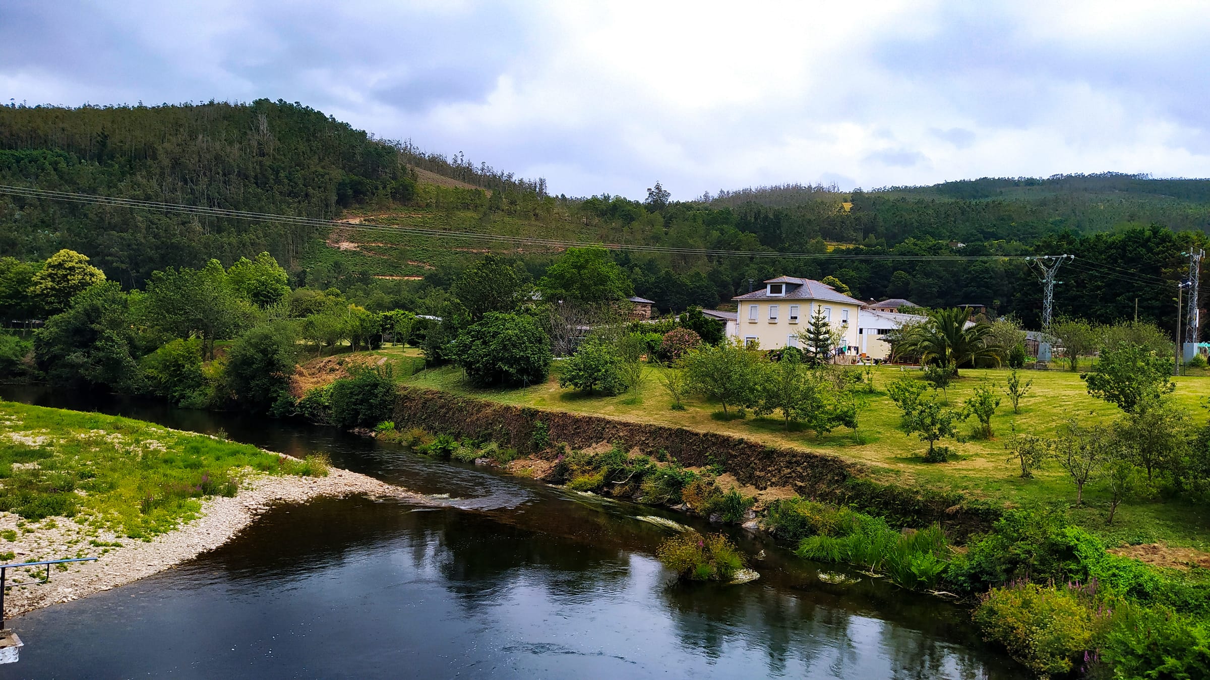 The Eo along the riverside walk at A Pontenova, Galicia, in summer.