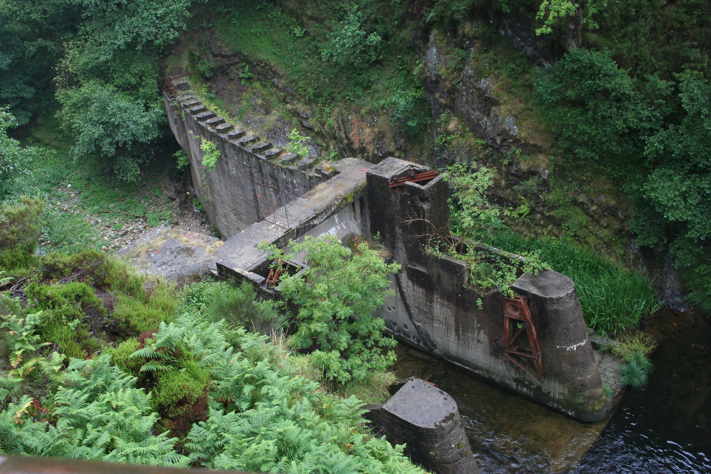 Remains of an ancient stone weir across the Río Esva in the Hoces gorge, Asturias.