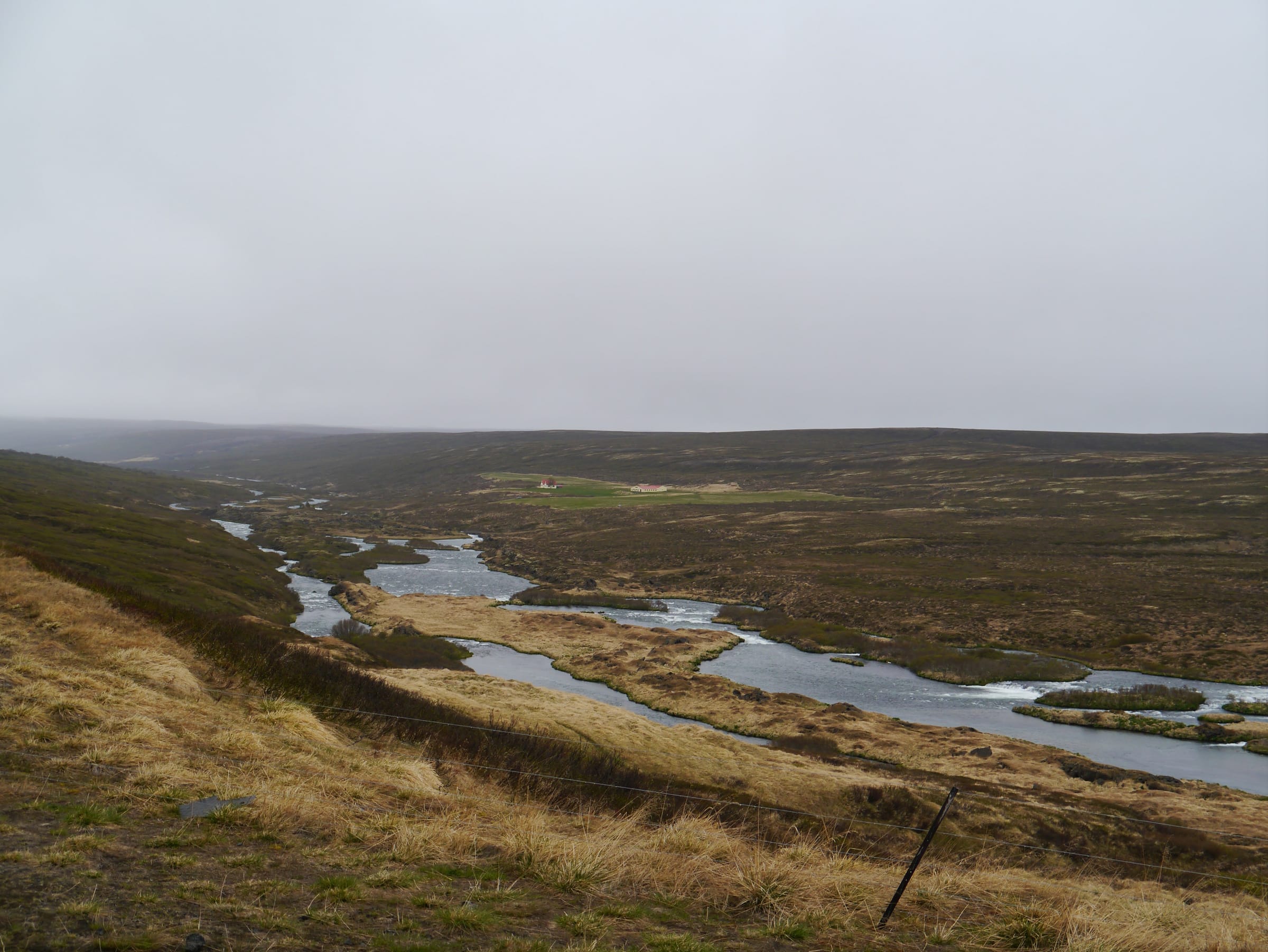 Braided channels of the Laxá í Aðaldal forming river islands where the Ring Road crosses north Iceland.