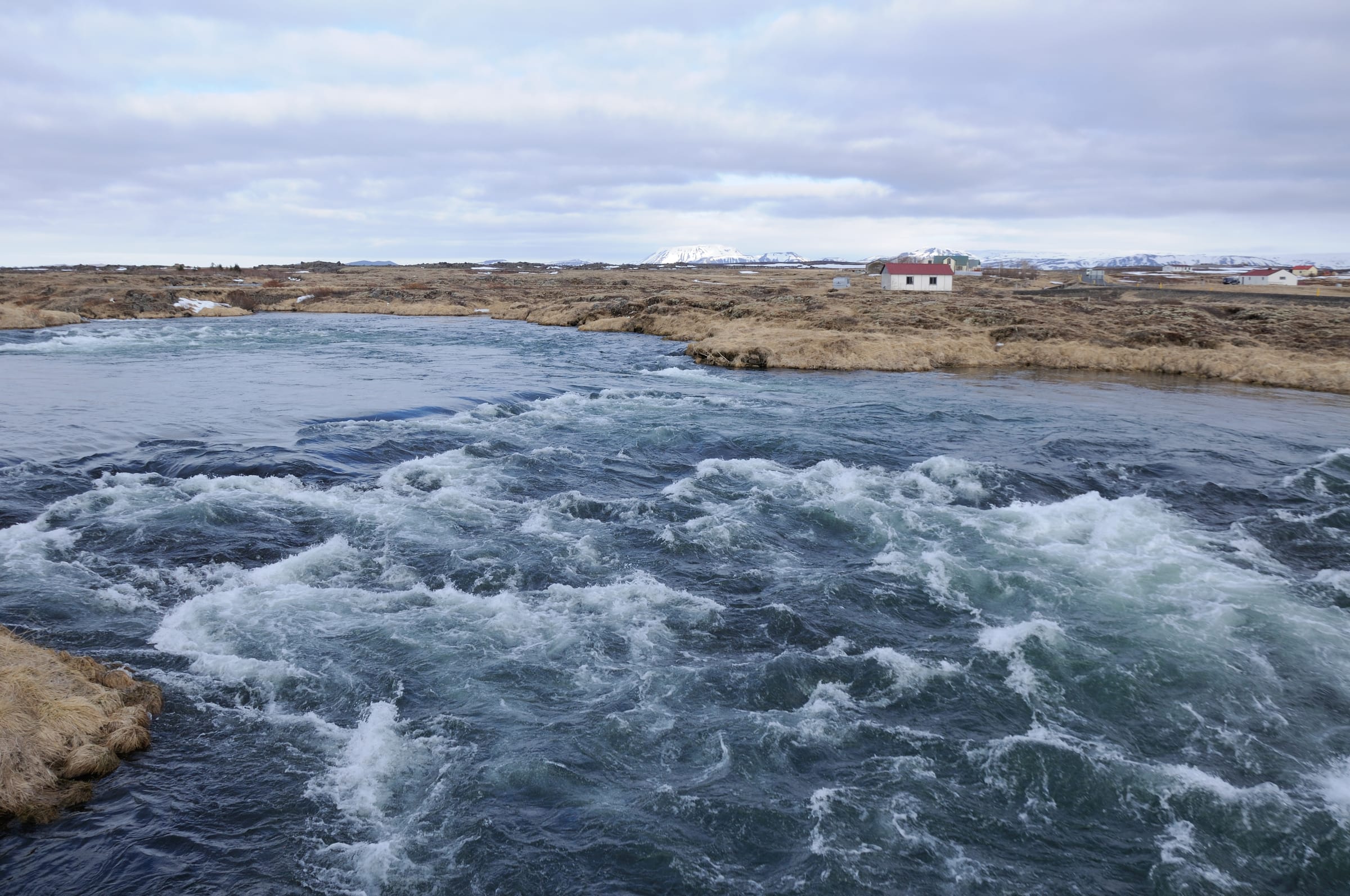 The Laxá river near Reykjahlíð, Mývatn, in late-April evening light, the upper river channel.