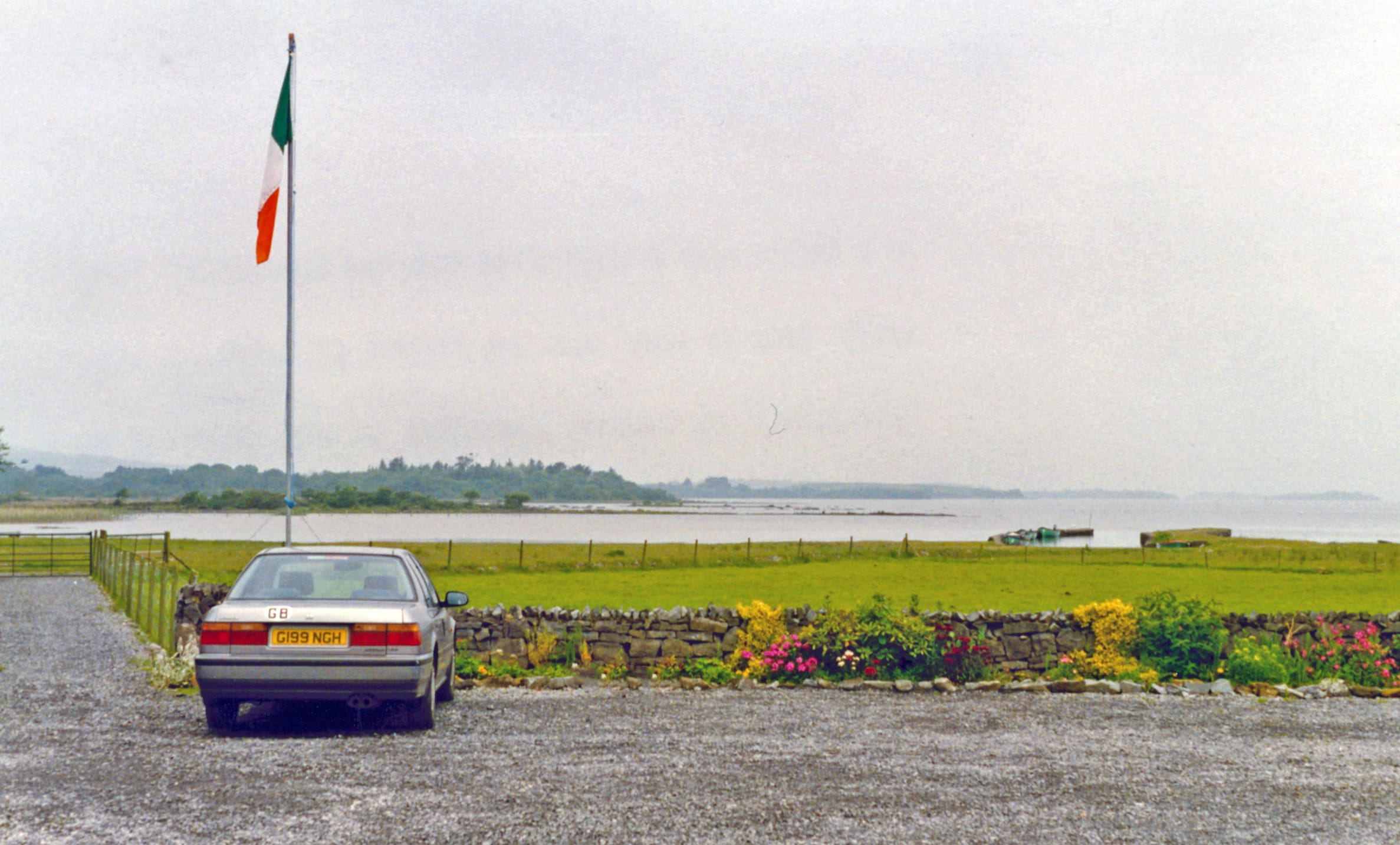 Lough Corrib seen from the shore at Oughterard, open water extending to the far bank.
