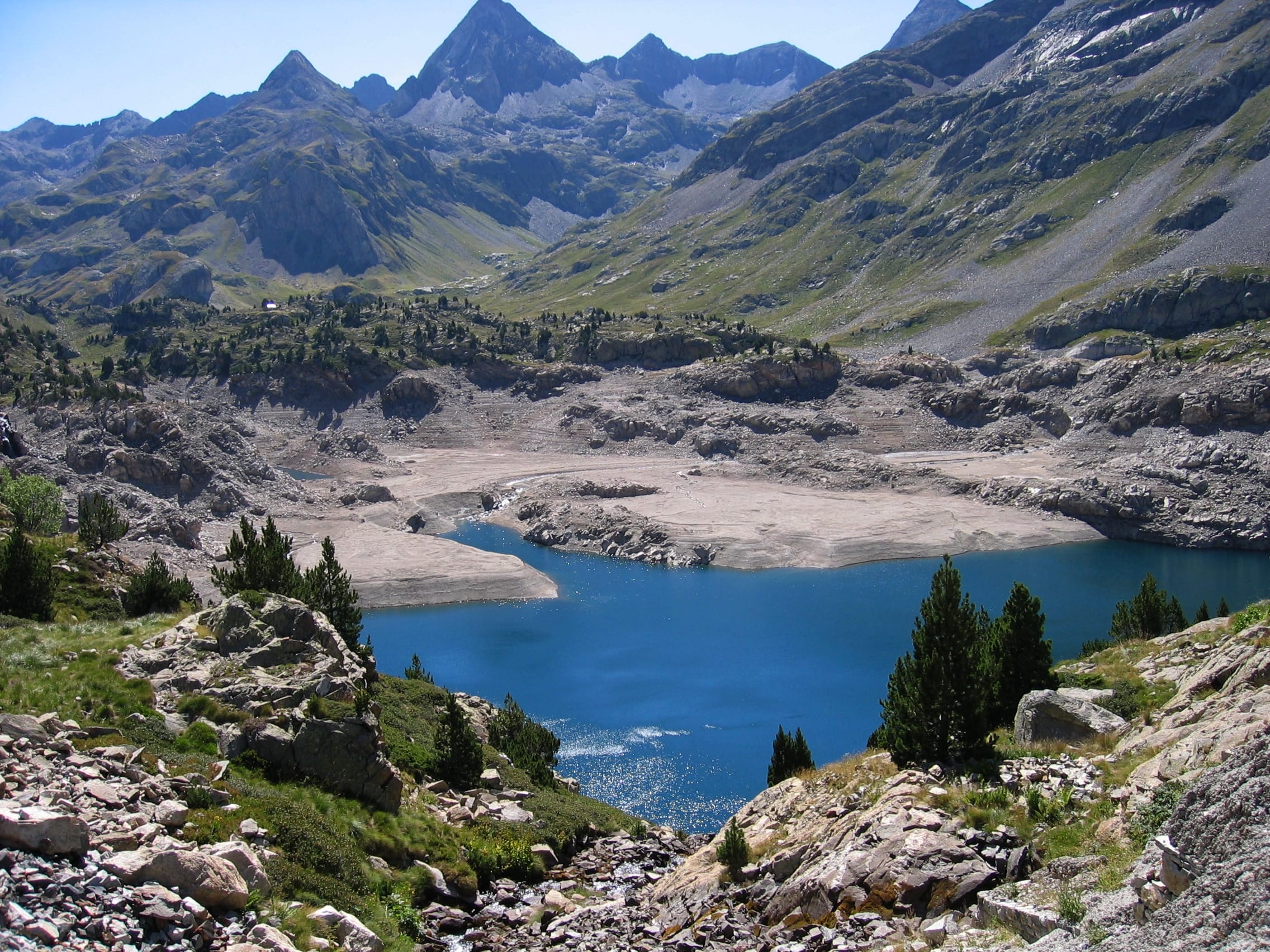 The high-mountain Respomuso lake in the Aragonese Pyrenees with the Piedrafita cirque behind.