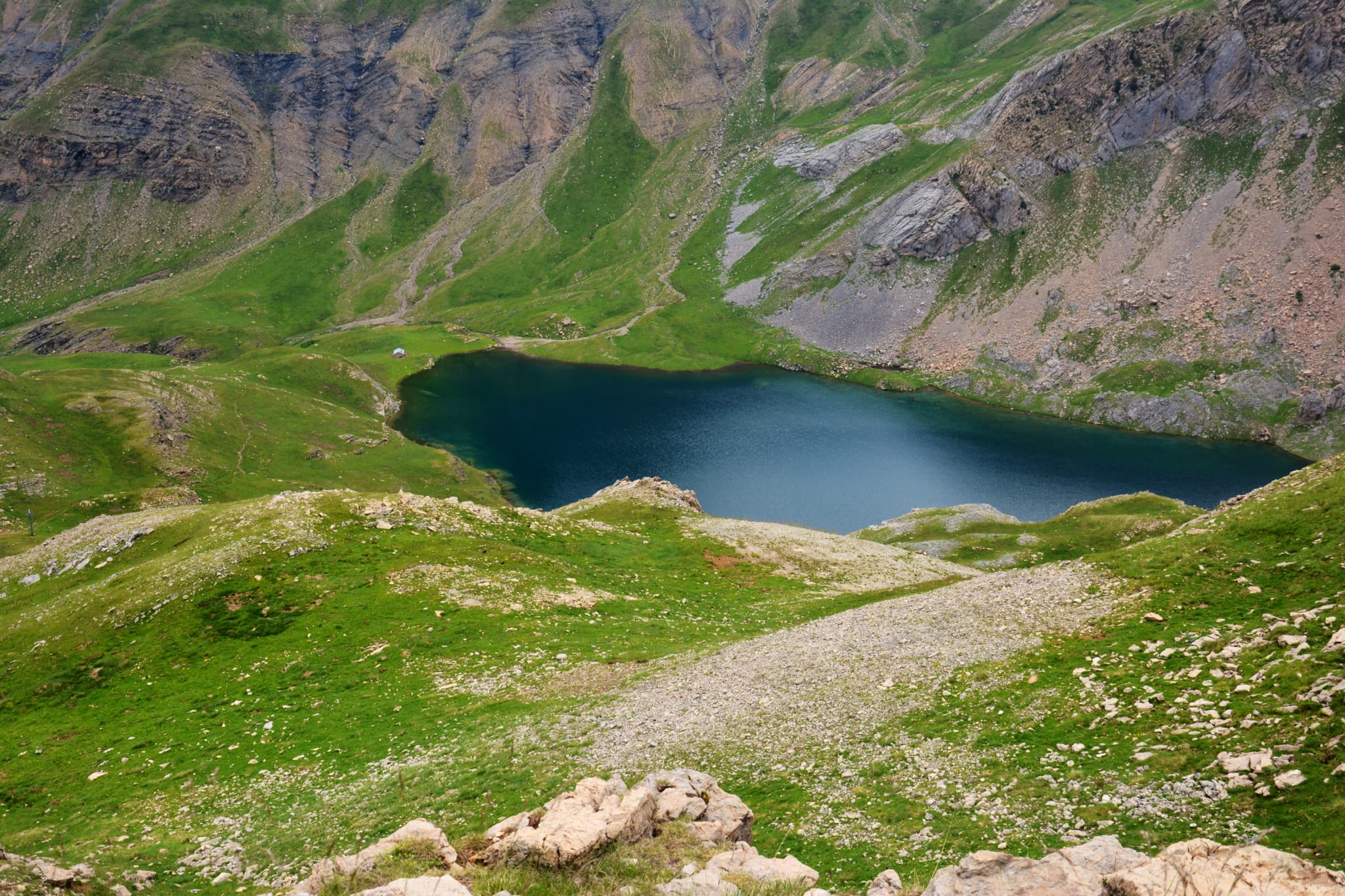 Ibón de Sabocos, a glacial lake above Panticosa in the Aragonese Pyrenees, turquoise mountain water.