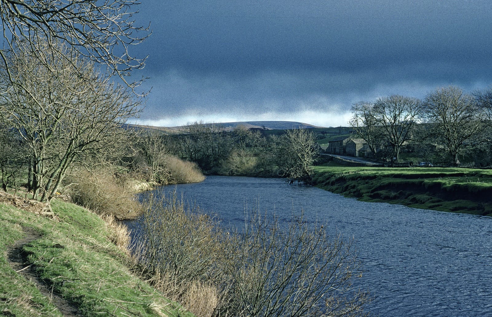 The River Ure winding through the valley floor near Throstle Nest between Askrigg and Thornton Rust.